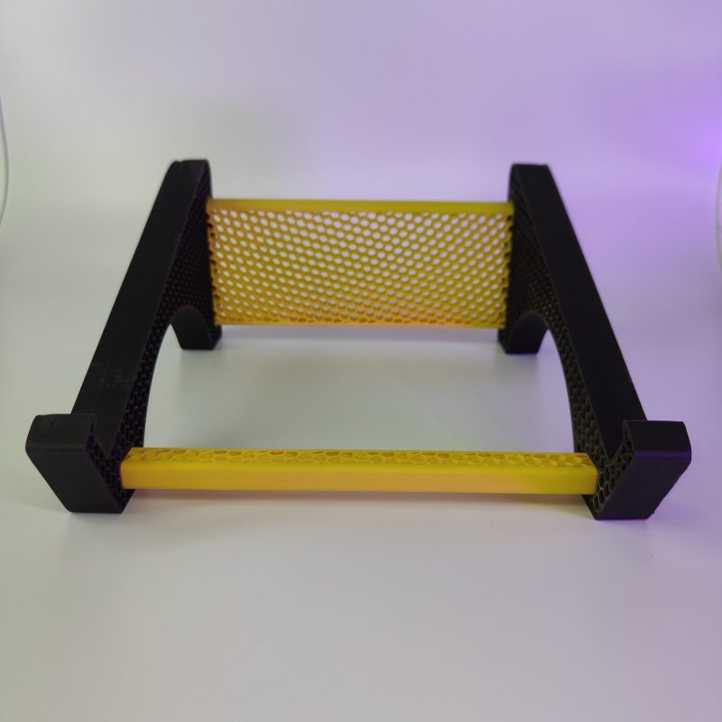 Black and yellow laptop stand, front view