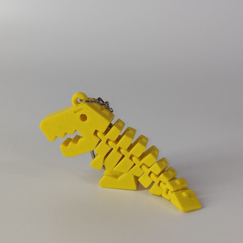 Banana yellow Flexi Rex 3D printed keychain