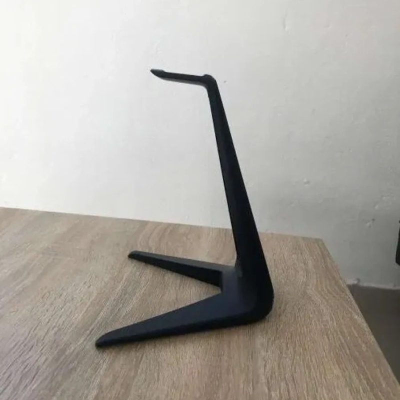 Black headphone stand, side view