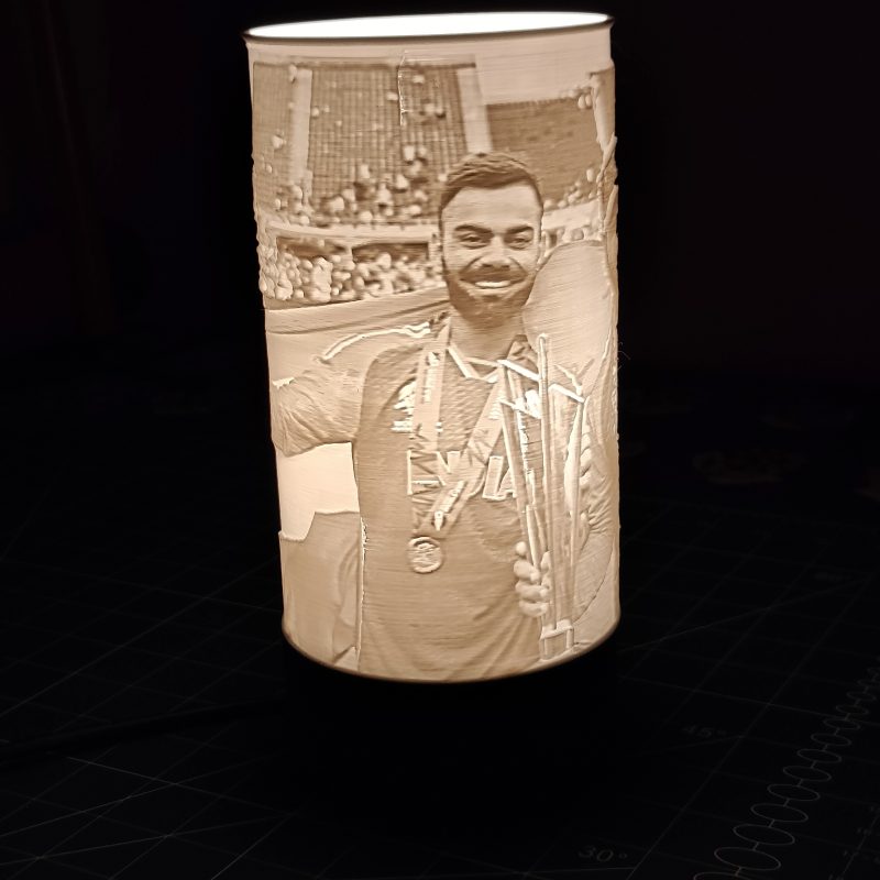 Litho Lamp in light mode, illuminating a custom photo